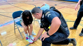 Dallas Police Provide New Shoes to More Than 500 Kids